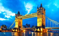 Iconic Tower Bridge Illuminated Against a Night Sky in London