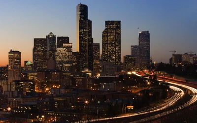 Vibrant Urban Nightscape: Skyscrapers Illuminate the Horizon