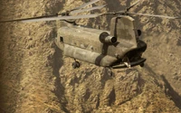 Boeing CH-47 Chinook Military Helicopter in Action Over Rugged Terrain