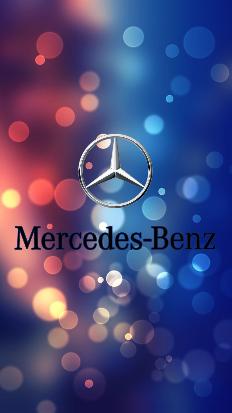 Крупный план логотипа мерседес на синем фоне (синий, боке, bokeh, машины, mercedes)