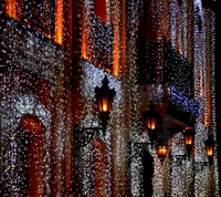 Enchanting Winter Illumination: Festive Lights Adorning an Elegant Facade