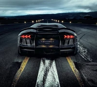 Futuristic Black Mansory Car on an Empty Highway