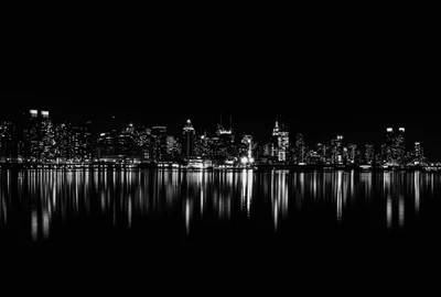 New York City Skyline at Night: Dark Aesthetic Reflections