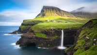 Majestic Coastal Waterfall Framing an Island Landscape