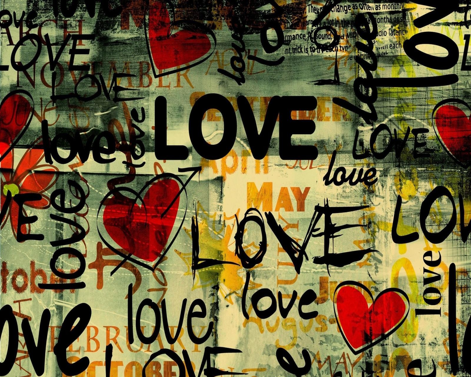 Graffiti on a wall with a lot of different types of love (heart, love note, wood)