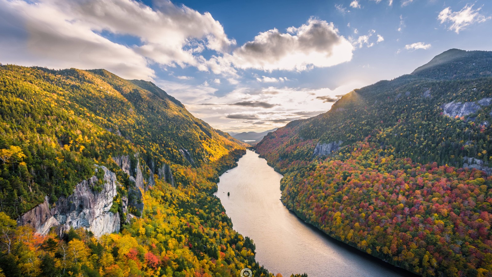 A river runs through a valley surrounded by trees and mountains (mountains, forest, valley, river, scenery)