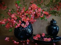 Vibrant Blossoms in Elegant Black Pottery