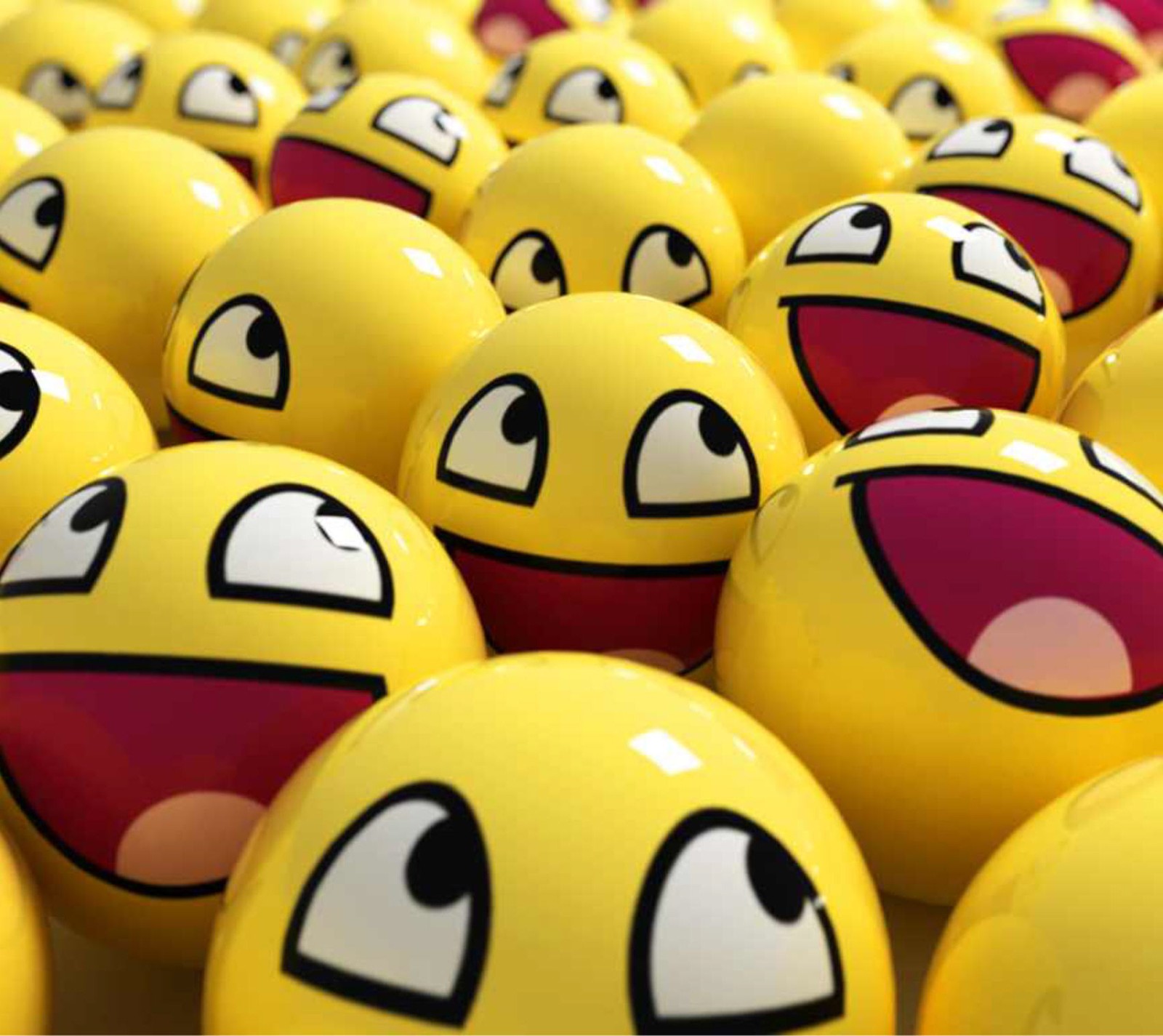 Yellow balls with faces are arranged in a row (happy, smile, smily face, yellow)