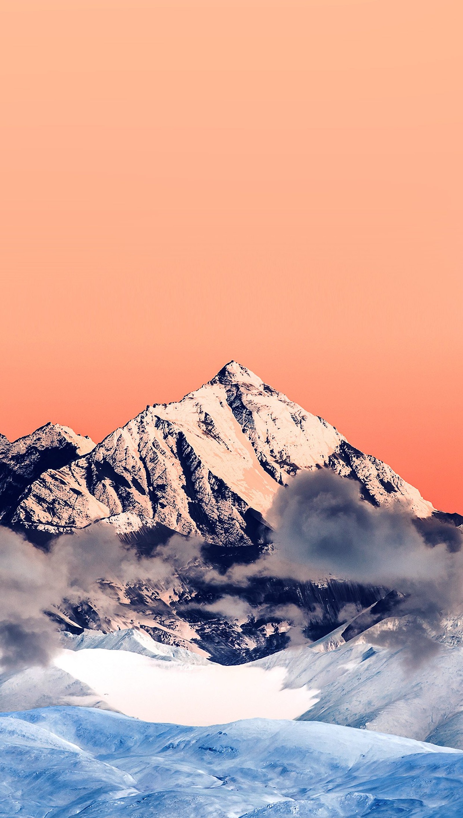 Mountains covered in snow and clouds with a pink sky (mountain, sunset)