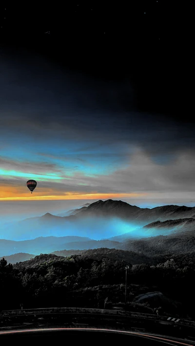 Abstract Dark Landscape with Hot Air Balloon Over Misty Mountains