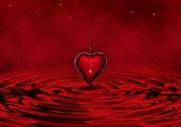 Red Heart Pendant on Rippled Water Background with Stars