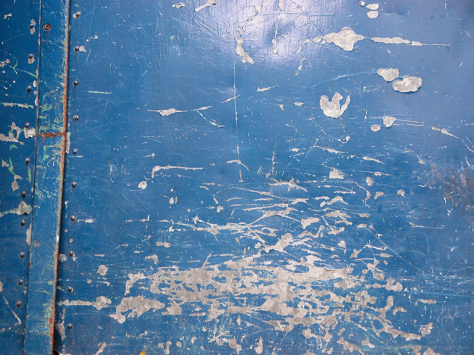 Arafed blue door with peeling paint and peeling paint on it (water, texture, blue, pattern, silver)