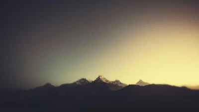 Annapurna Dusk: Majestic Mountains Bathed in Sunset Afterglow