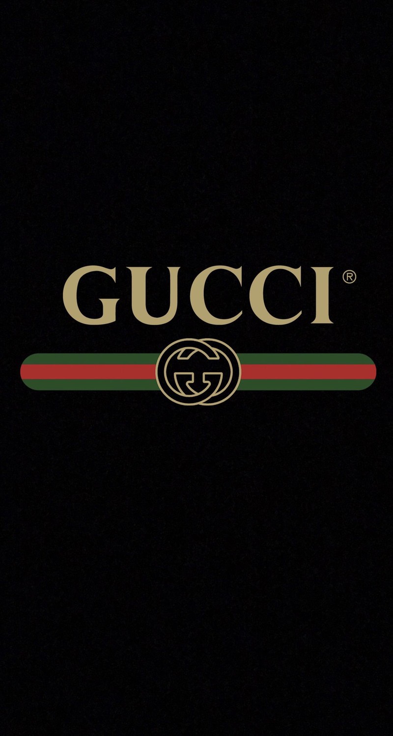 Макро-снимок черного фона с логотипом gucci (стильно, дизайнер, дорогой, высококачественный, логотип)