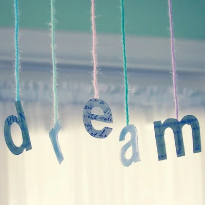 Colorful 'Dream' Hanging Letters for iPad 3 Wallpaper