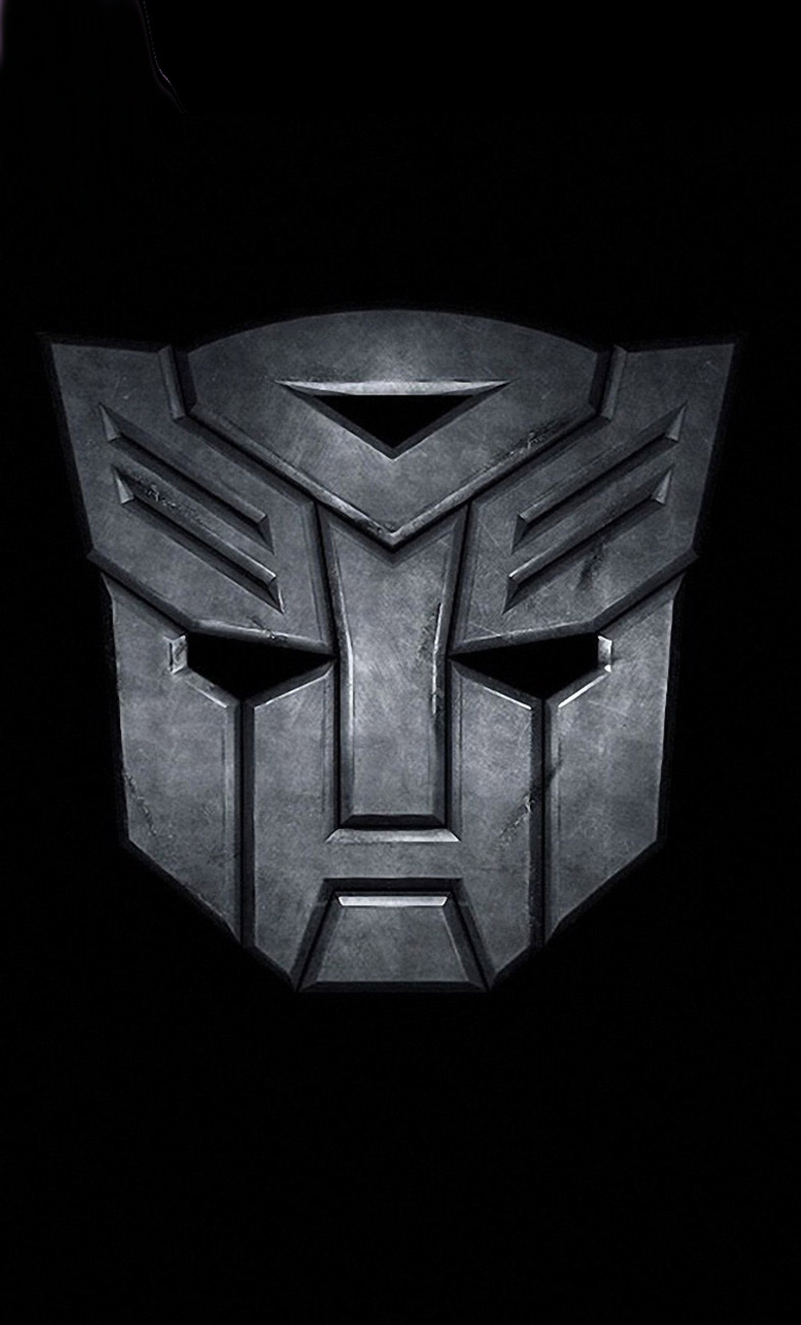 Un primer plano de un logotipo negro y plateado sobre un fondo negro (autobot, decepticon, hd, logotipo, optimus)