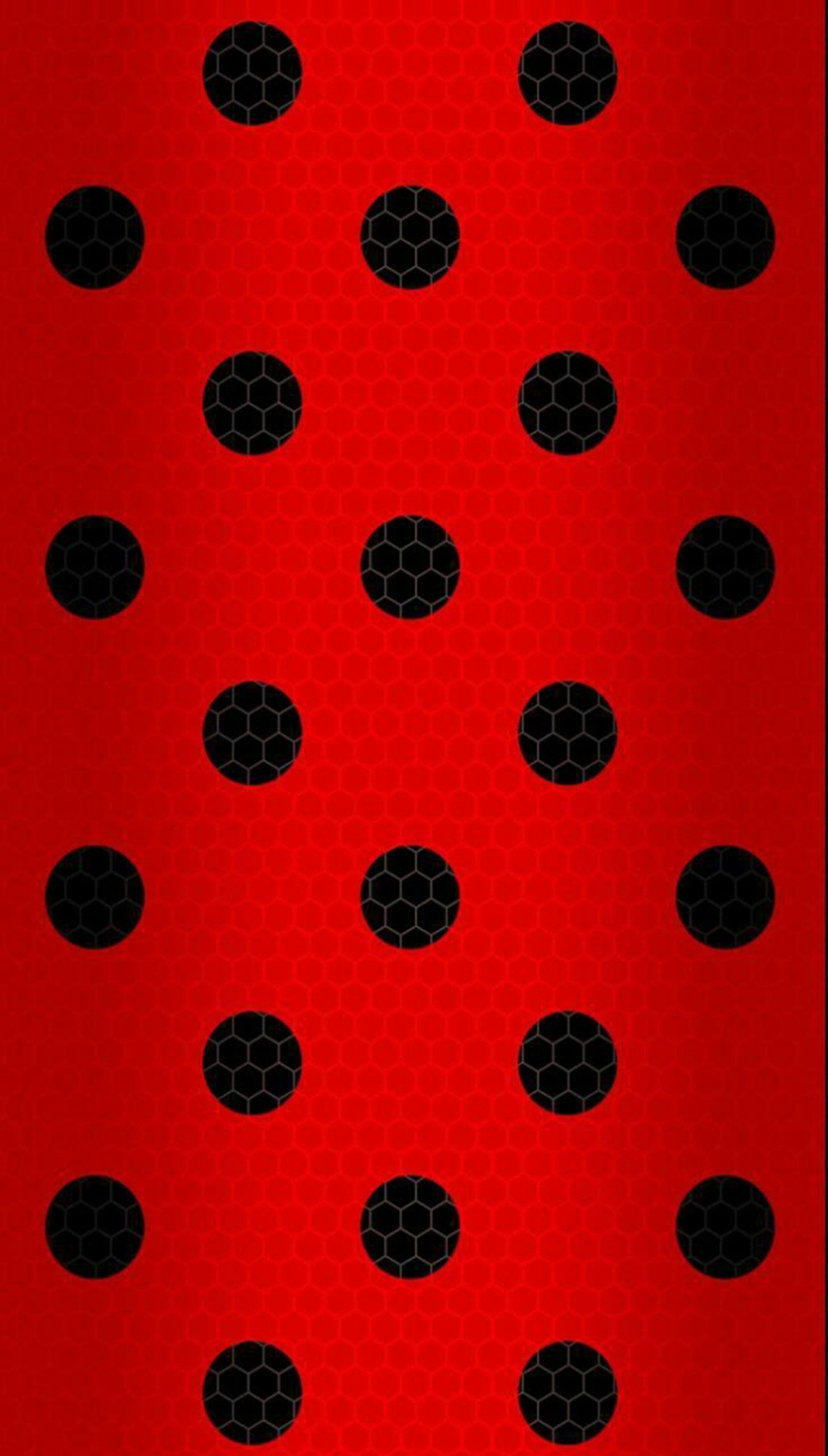 Un primer plano de un patrón de lunares rojo y negro (logotipo, miraculous ladybug)