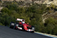 Scuderia Ferrari carro de Fórmula Um correndo em uma pista sinuosa.