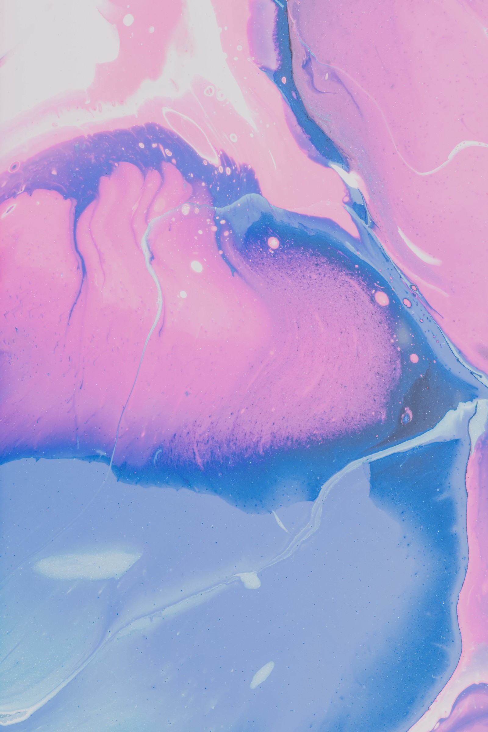 Purple and blue paint pouring over a pink and blue background (painting, water, pink, liquid, fluid)