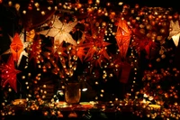 Vibrant Christmas Market Display with Festive Ornaments and Lights