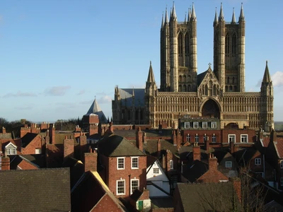 Lincoln Cathedral: A Masterpiece of Gothic Architecture Amidst Historic Rooftops