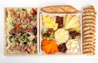 Colorful Antipasto Platter with Salad, Cheese, and Bread