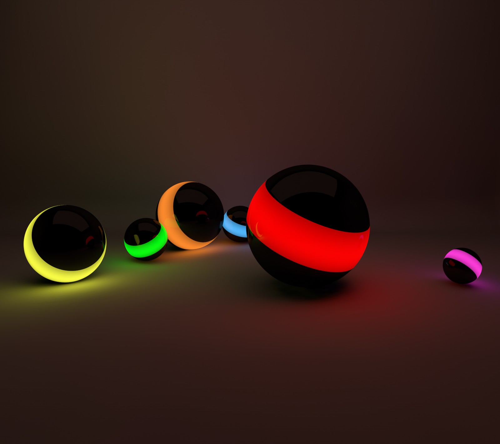 Un gros plan d'un groupe de boules lumineuses sur une table (balle, balles, marron, couleurs, sombre)