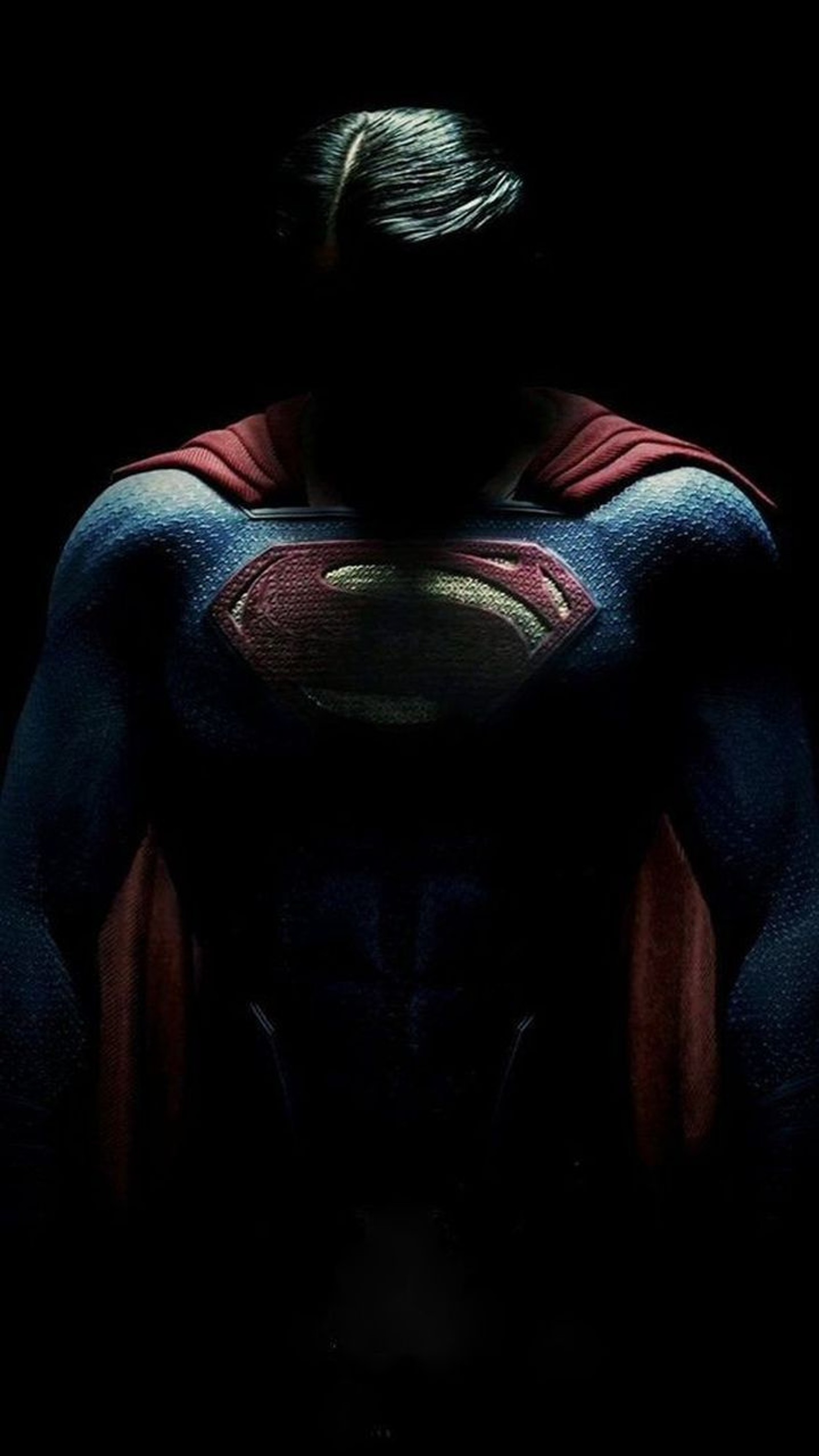 Superman in the dark with his cape up (man, super)