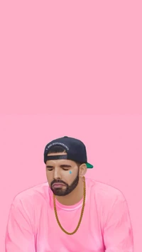 Drake in a Pink Sweater: Emotional Portrait Wallpaper