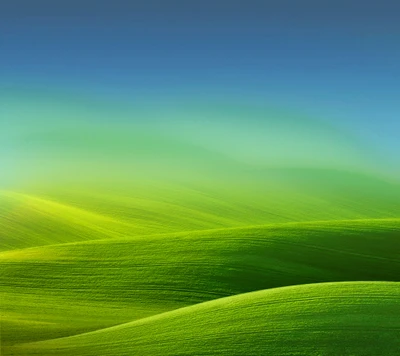 Lebendige grüne Landschaft mit sanftem blauen Himmel