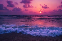 Vibrant Sunset Over Ocean Waves