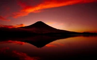 Monte Fuji ao amanhecer: Uma reflexão serena em um céu de resplendor