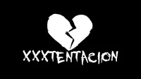 Tributo a XXXTentacion: Arte de Coração Partido em Fundo Preto