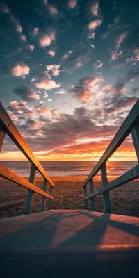 Escalera al Crepúsculo: Abrazando el Resplandor sobre Agua y Nubes