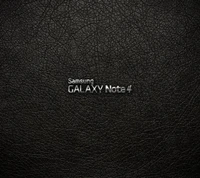 Samsung Galaxy Note 4 on Black Leather Background