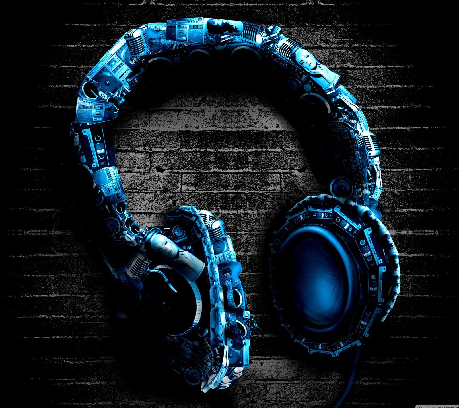 A close up of a pair of headphones on a brick wall (electro, headphones, trance)