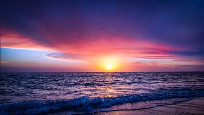 Vibrant Sunset Over Tranquil Ocean Waves