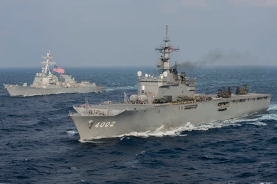 Japanese Navy Guided Missile Destroyer and Bell Boeing V-22 Osprey in Action