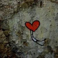 Graffiti Heart: A Symbol of Love on a Weathered Wall