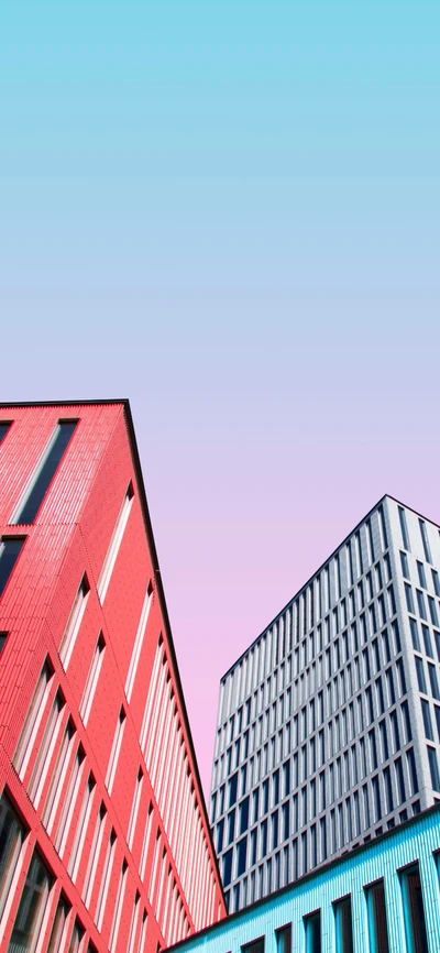 Colorful Urban Facade: Modern Skyscrapers in Pink and Blue