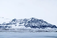 Majestic Glacier Peaks Reflected on Icy Waters