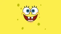 Aesthetic SpongeBob Smiley Face on a Bright Yellow Background