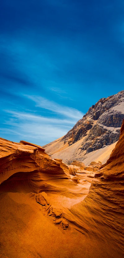 Vibrant Landscape of Red Rock Formations Under a Clear Blue Sky