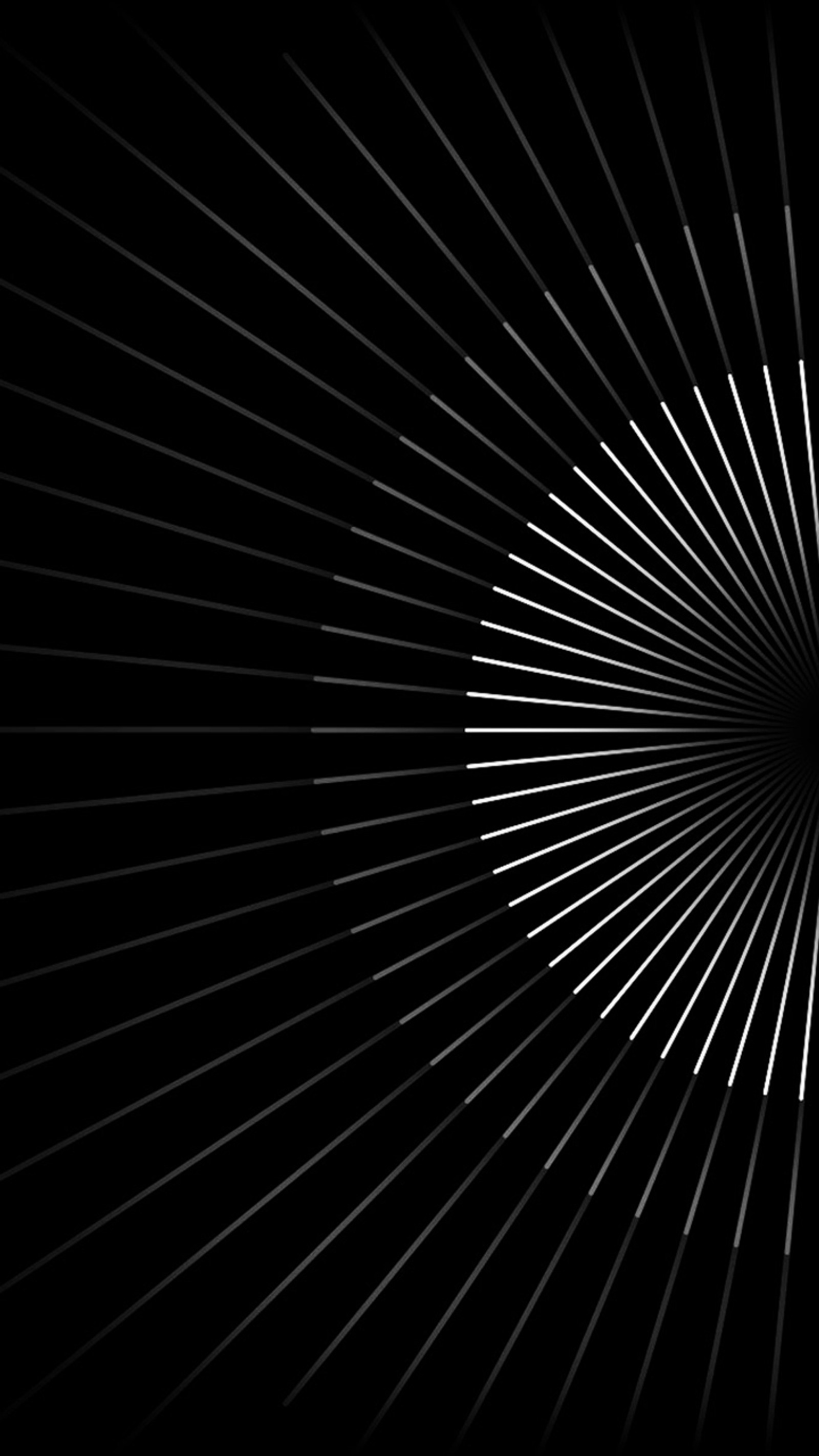 A close up of a black and white background with a sunburst (black, circle, line, lines, stripe)