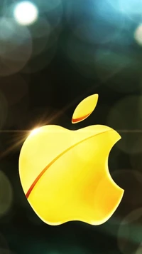 Goldener Apfel auf dem iPhone-Startbildschirm mit weichem Bokeh-Hintergrund