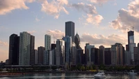 Chicago Skyline Reflected in Water Under a Cloudy Daytime Sky