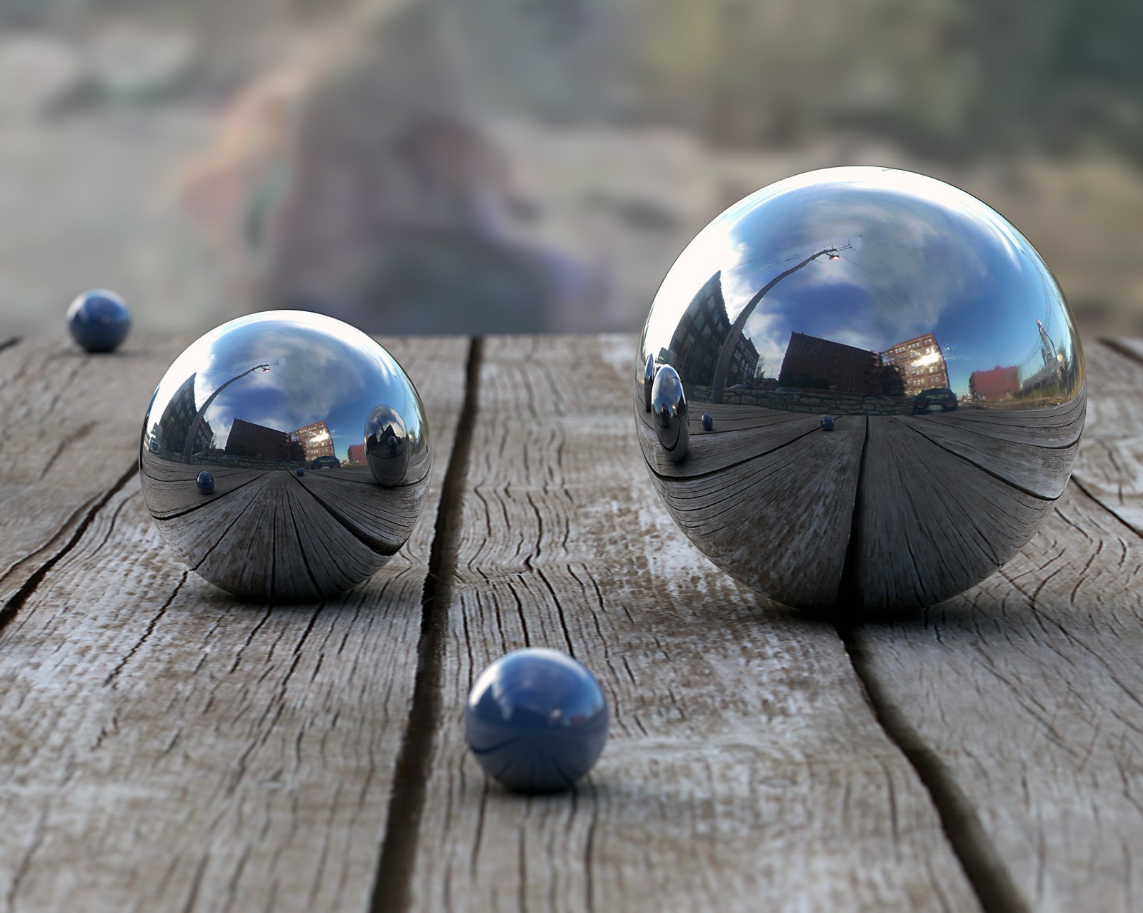 Il y a trois sphères brillantes posées sur une table en bois (3d, cercle, profondeur, paysage, argent)