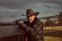 Western Landscape with Cowboy Hat and Dramatic Sky