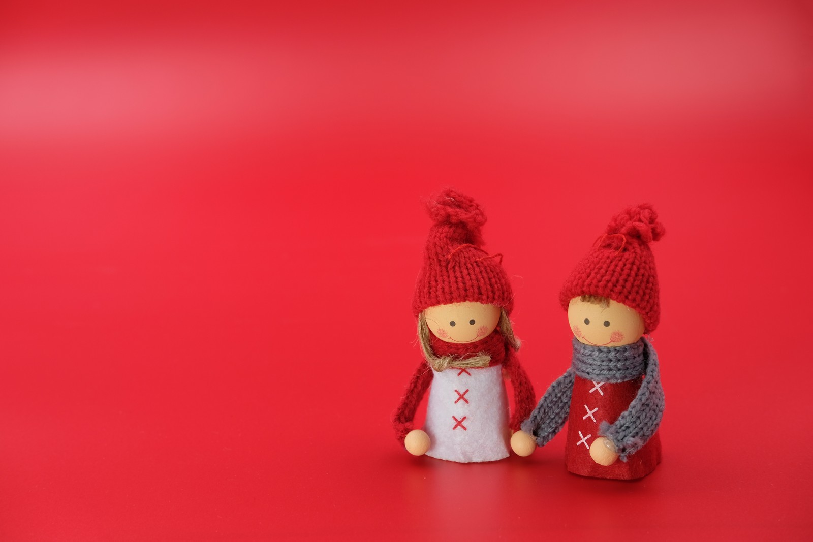 figures, man, woman, christmas decoration, red background wallpaper