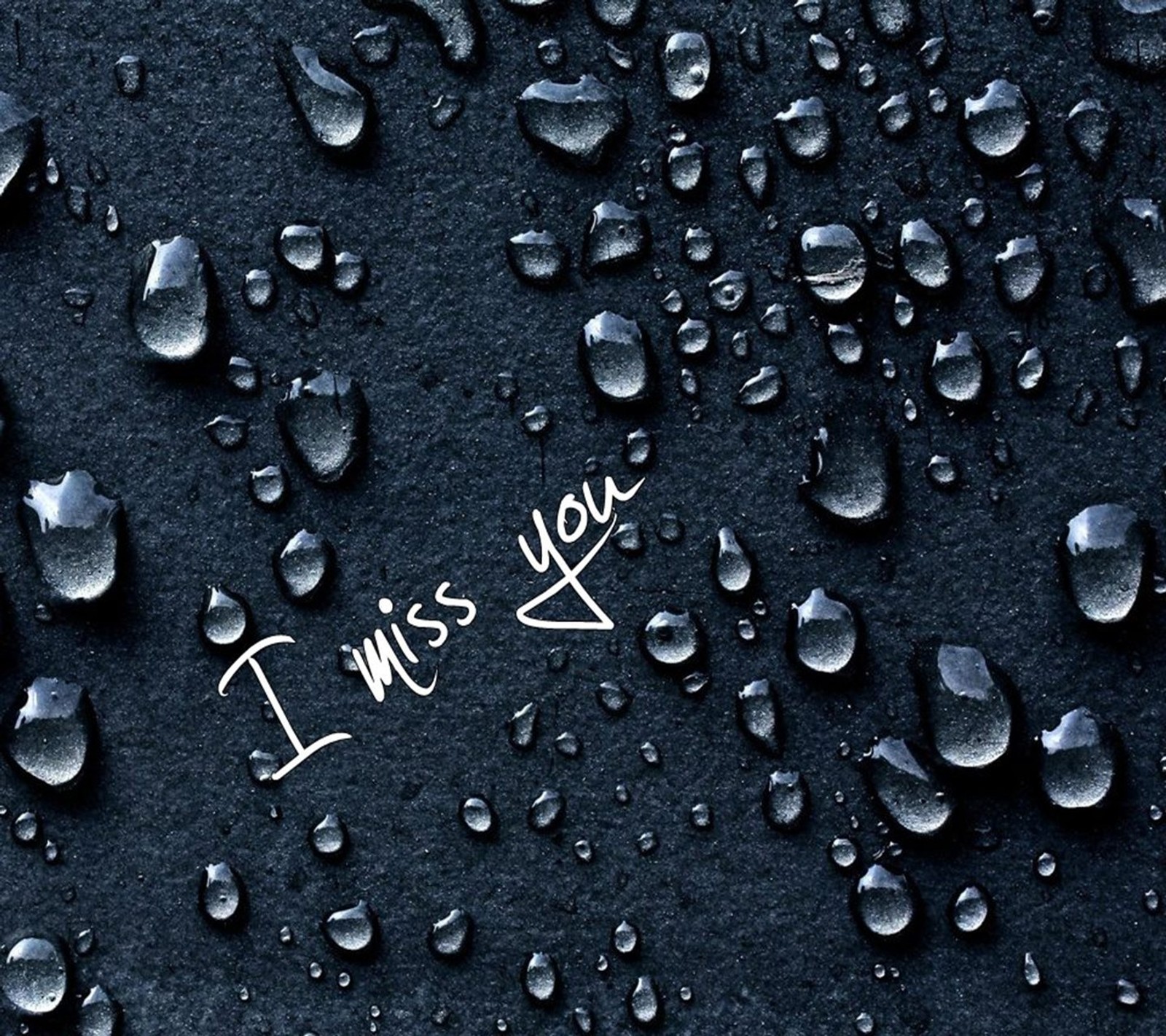 A close up of a black surface with water droplets on it (alone, emo, heart, i love you, i miss you)